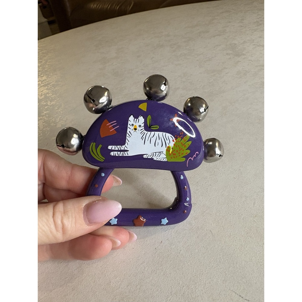 Baby Care Purple Hand Rattle Toy with Jingle Bells and White Tiger Illustration